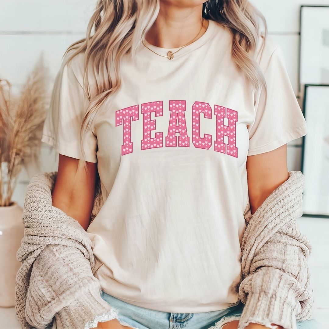 "TEACH" Heart Varsity Letter Teacher T-shirt